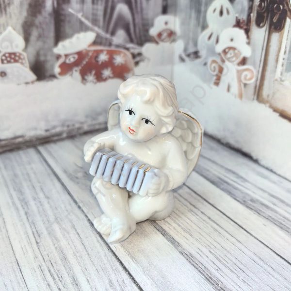 Фарфор Ангелочек с гармонью